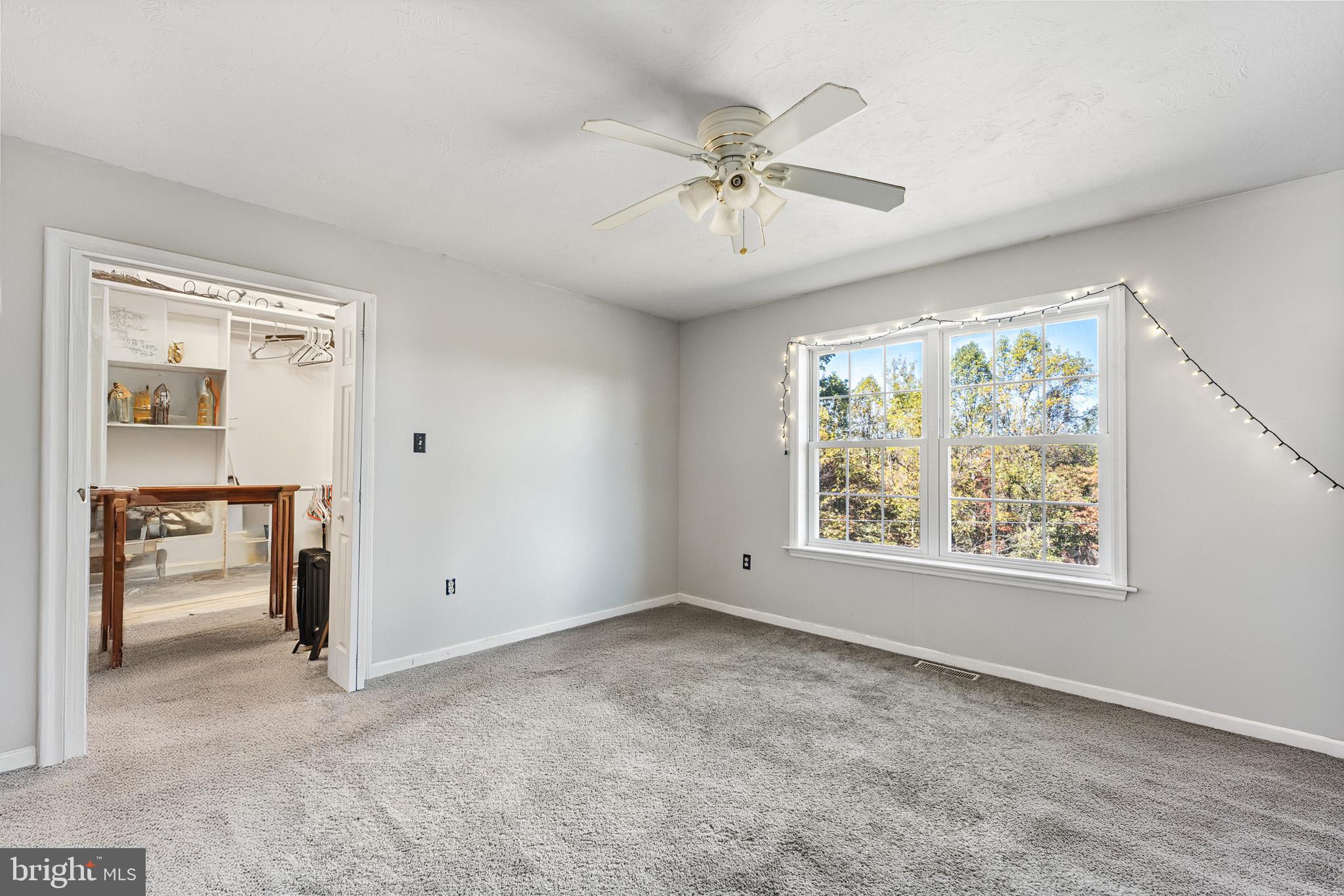 225 Pine Ridge Road Aspers, PA 17304 - Photo 15 of 42 an empty room with windows and closet
