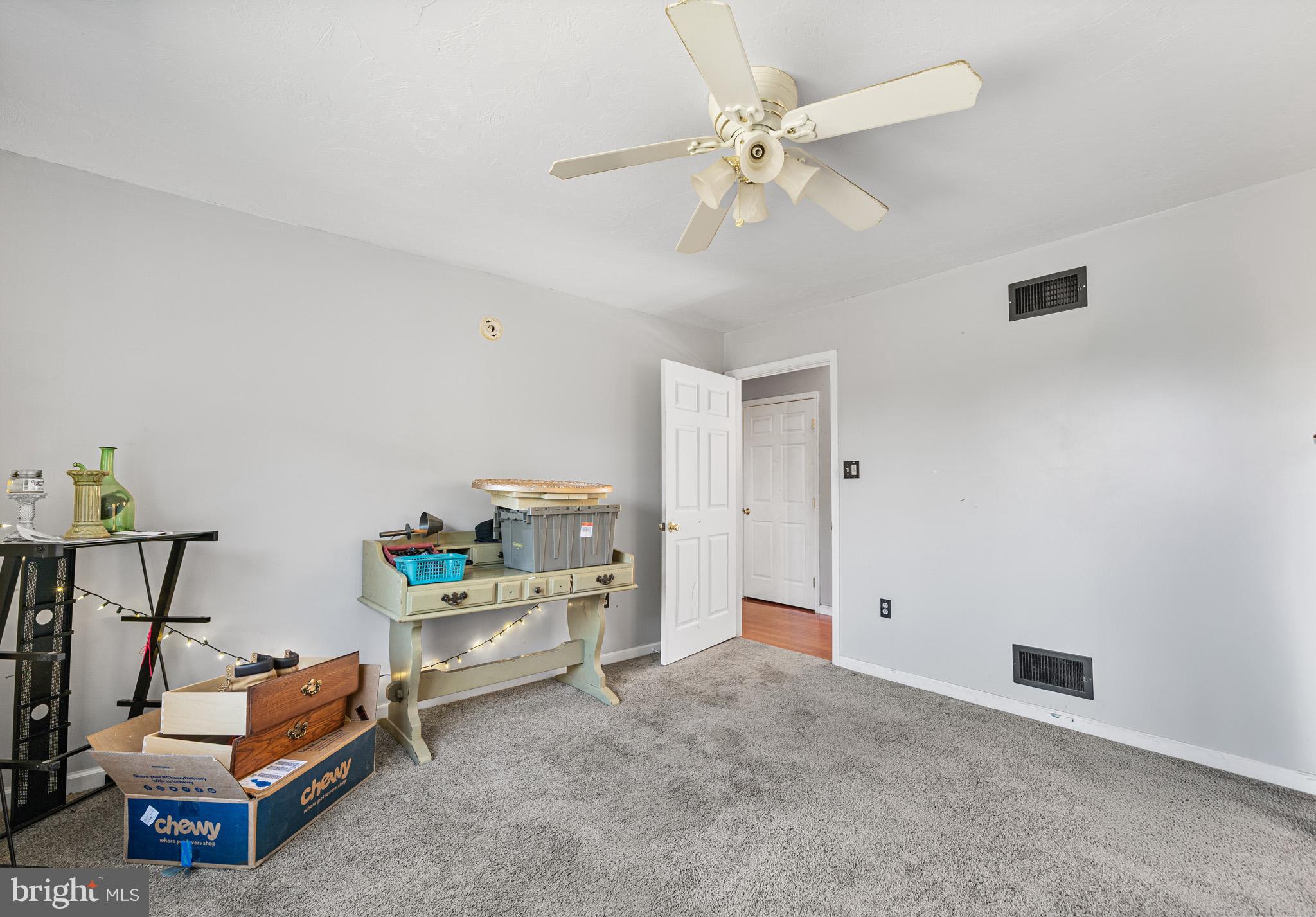 225 Pine Ridge Road Aspers, PA 17304 - Photo 16 of 42 a bedroom with furniture and a chandelier fan