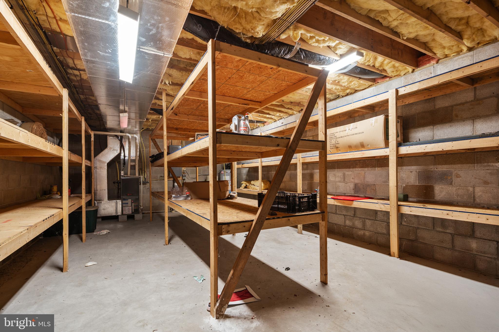 225 Pine Ridge Road Aspers, PA 17304 - Photo 26 of 42 a view of an empty room with wooden floor and furniture