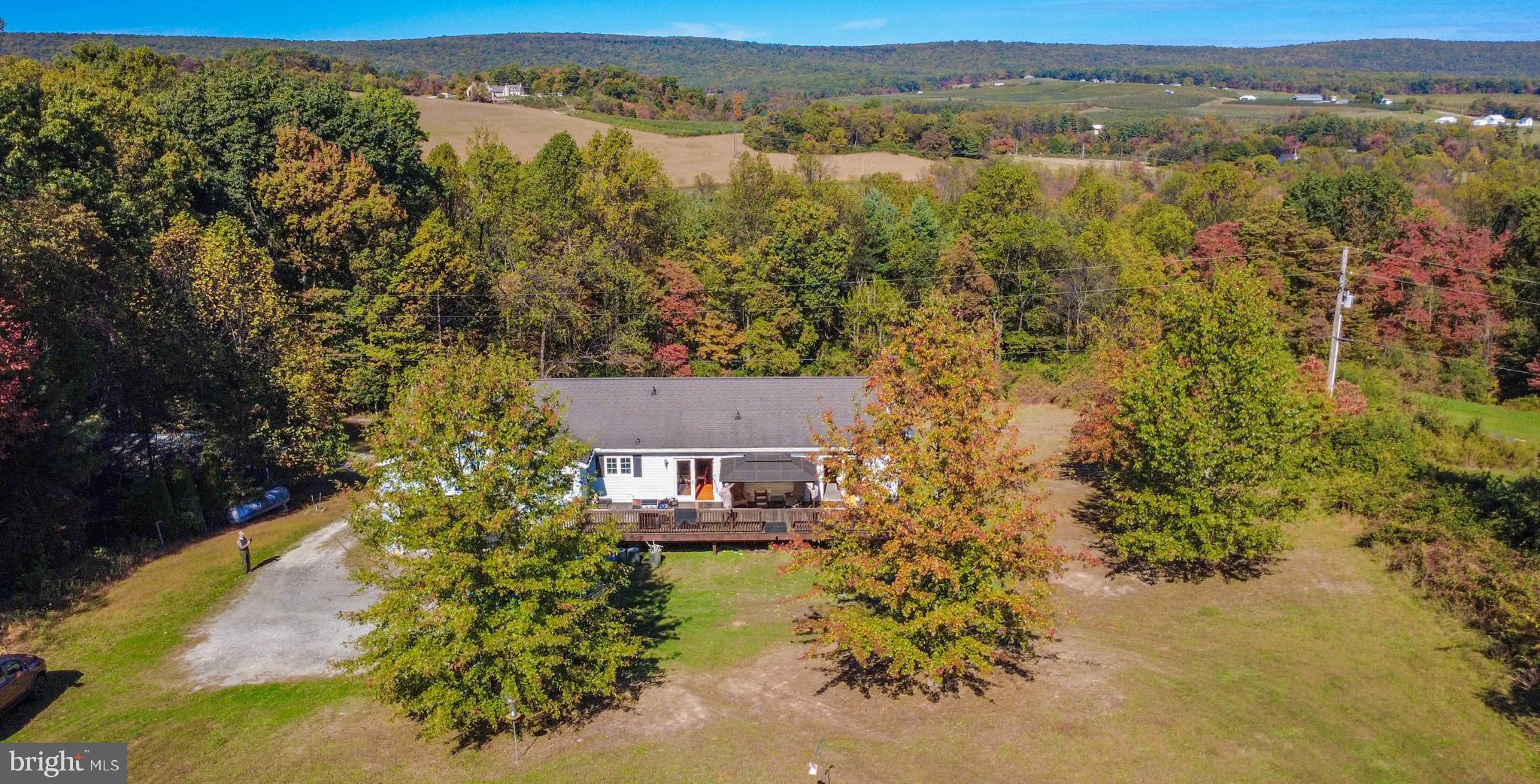 225 Pine Ridge Road Aspers, PA 17304 - Photo 35 of 42 an aerial view of a house with a lake view