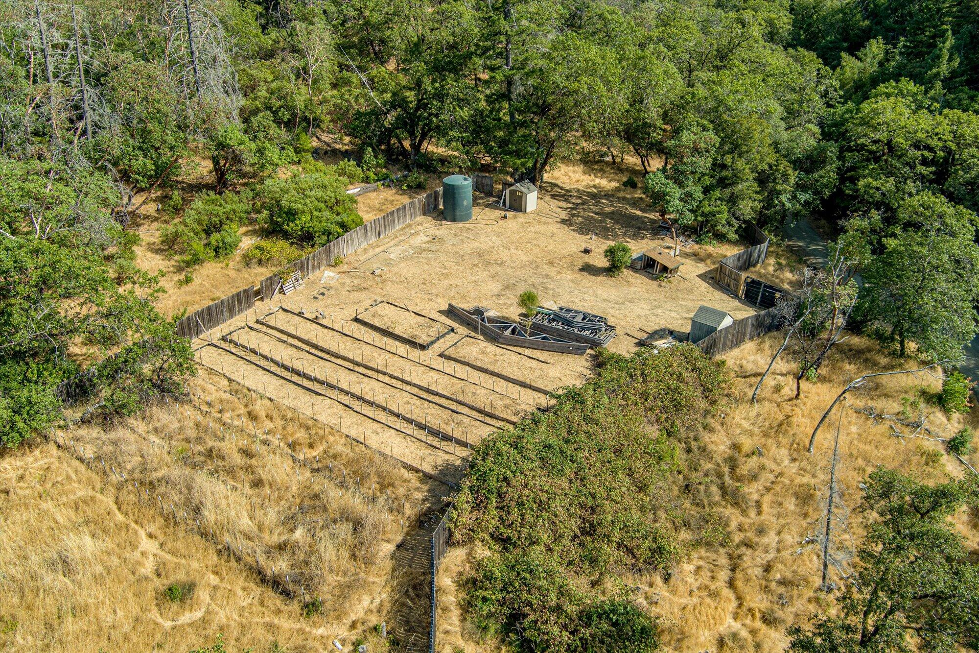 1991 Steelhead Road Alderpoint, CA 95511 - Photo 53 of 66 Fenced portion of Property with Garden Beds and Well. Southeast side of property.
