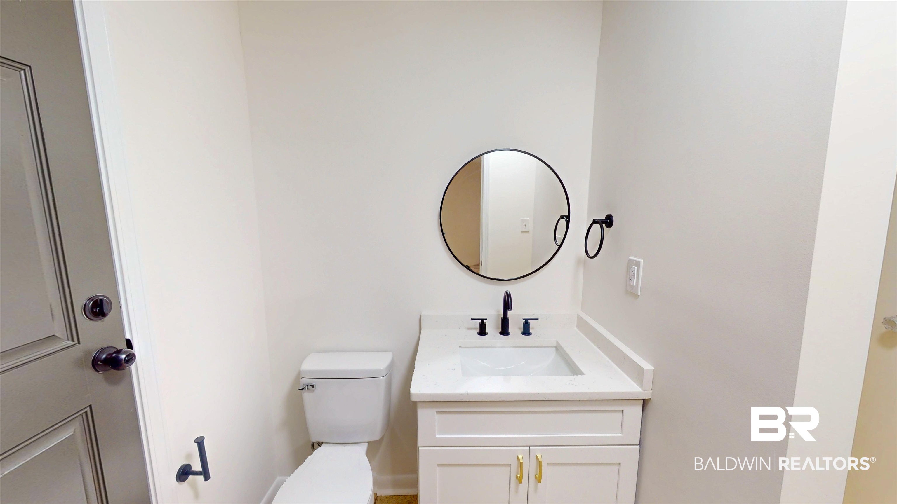 22711 Highway 98 Foley, AL 36535 - Photo 45 of 74 Half bathroom with vanity and toilet