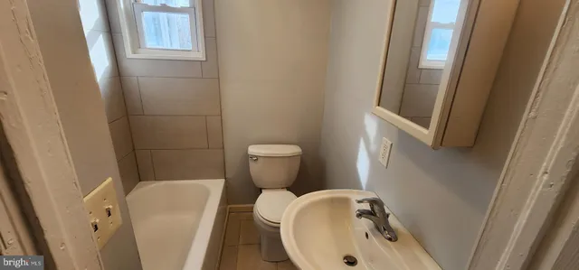 a bathroom with a sink and a toilet
