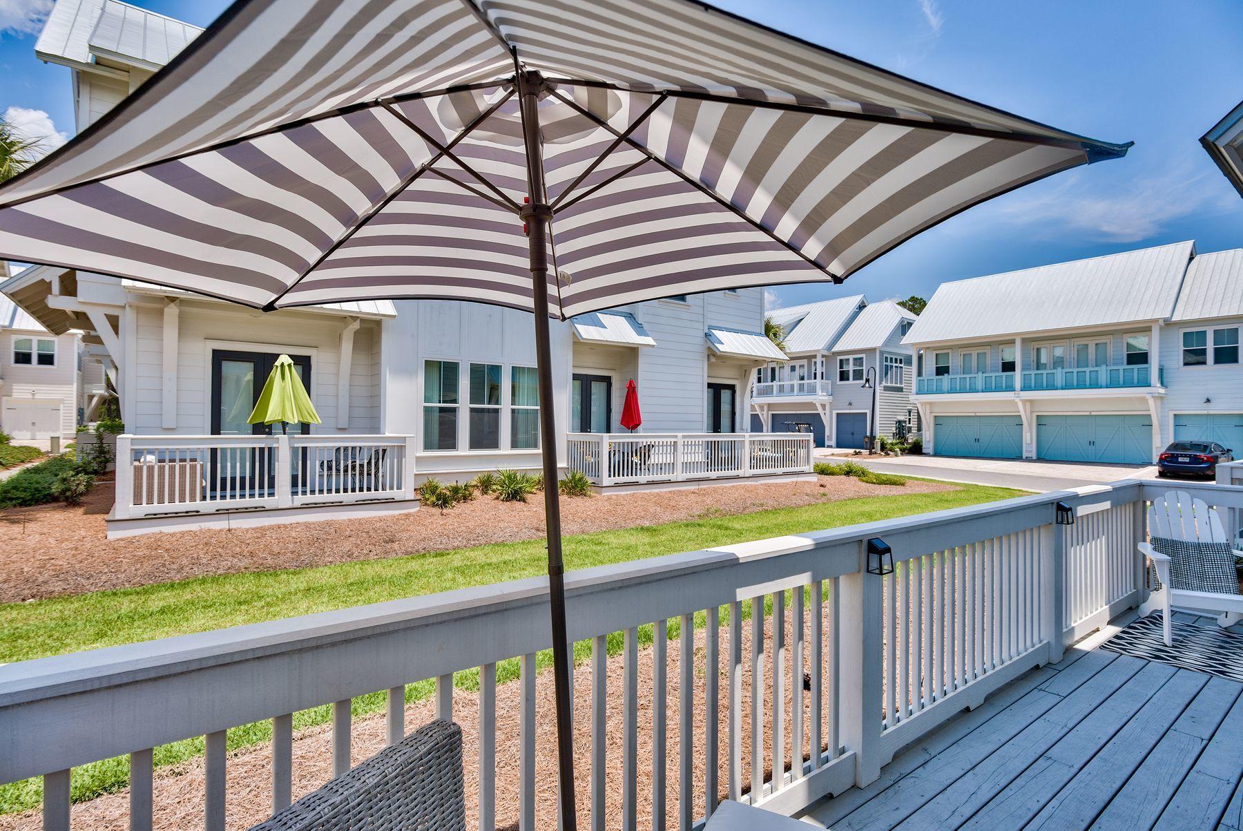35 Milestone Dr Inlet Beach, Unit A Inlet Beach, FL 32461 - Photo 13 of 31 a view of a patio with a backyard