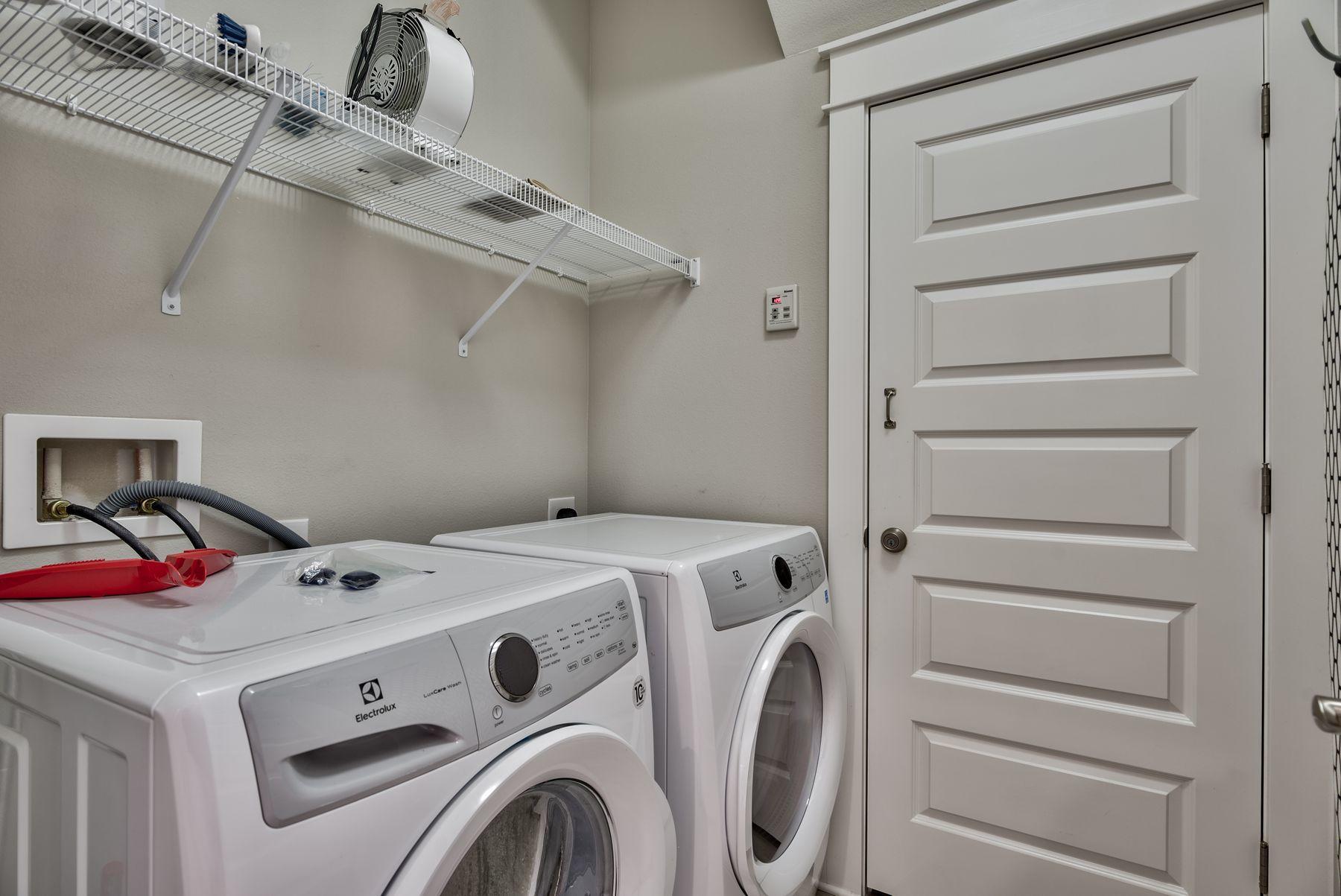 35 Milestone Dr Inlet Beach, Unit A Inlet Beach, FL 32461 - Photo 26 of 31 a utility room with dryer and washer