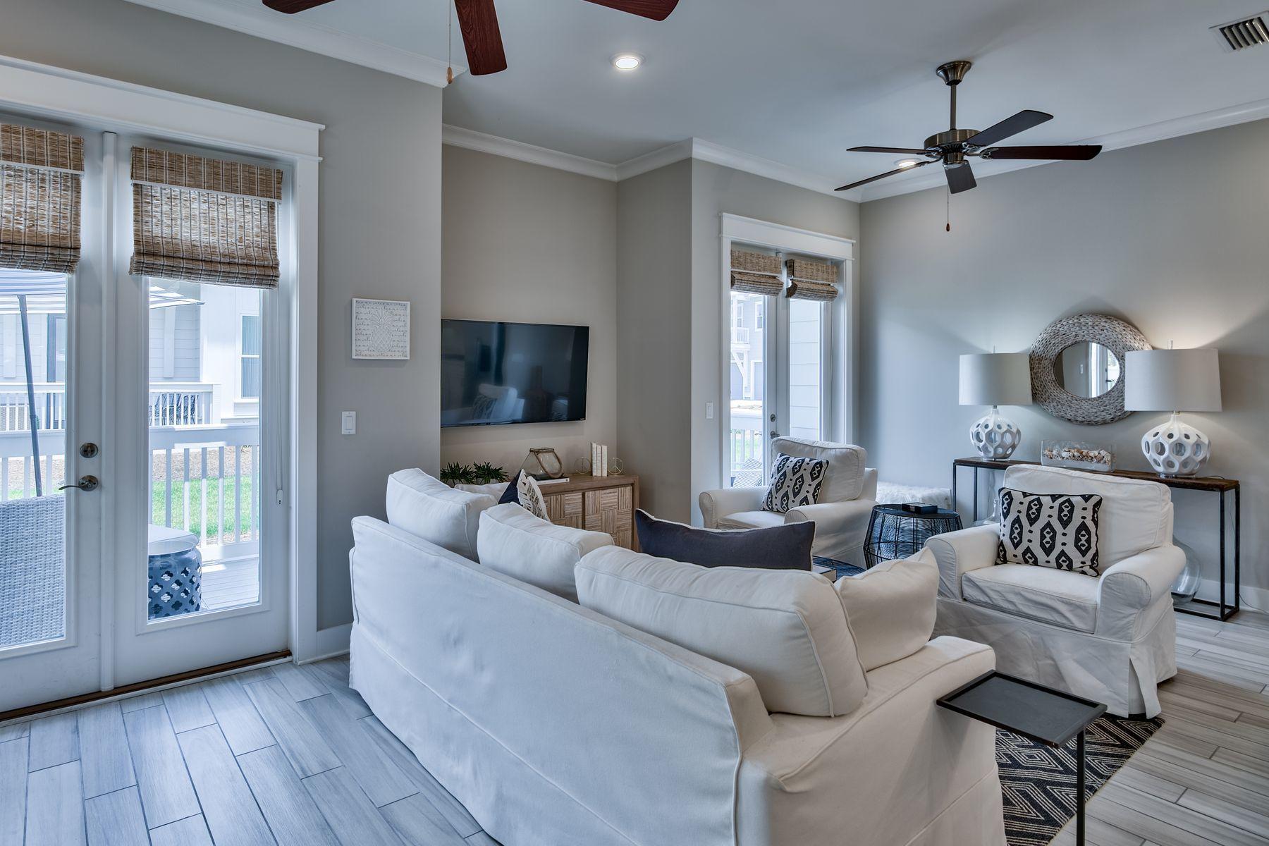 35 Milestone Dr Inlet Beach, Unit A Inlet Beach, FL 32461 - Photo 6 of 31 a living room with furniture and a flat screen tv