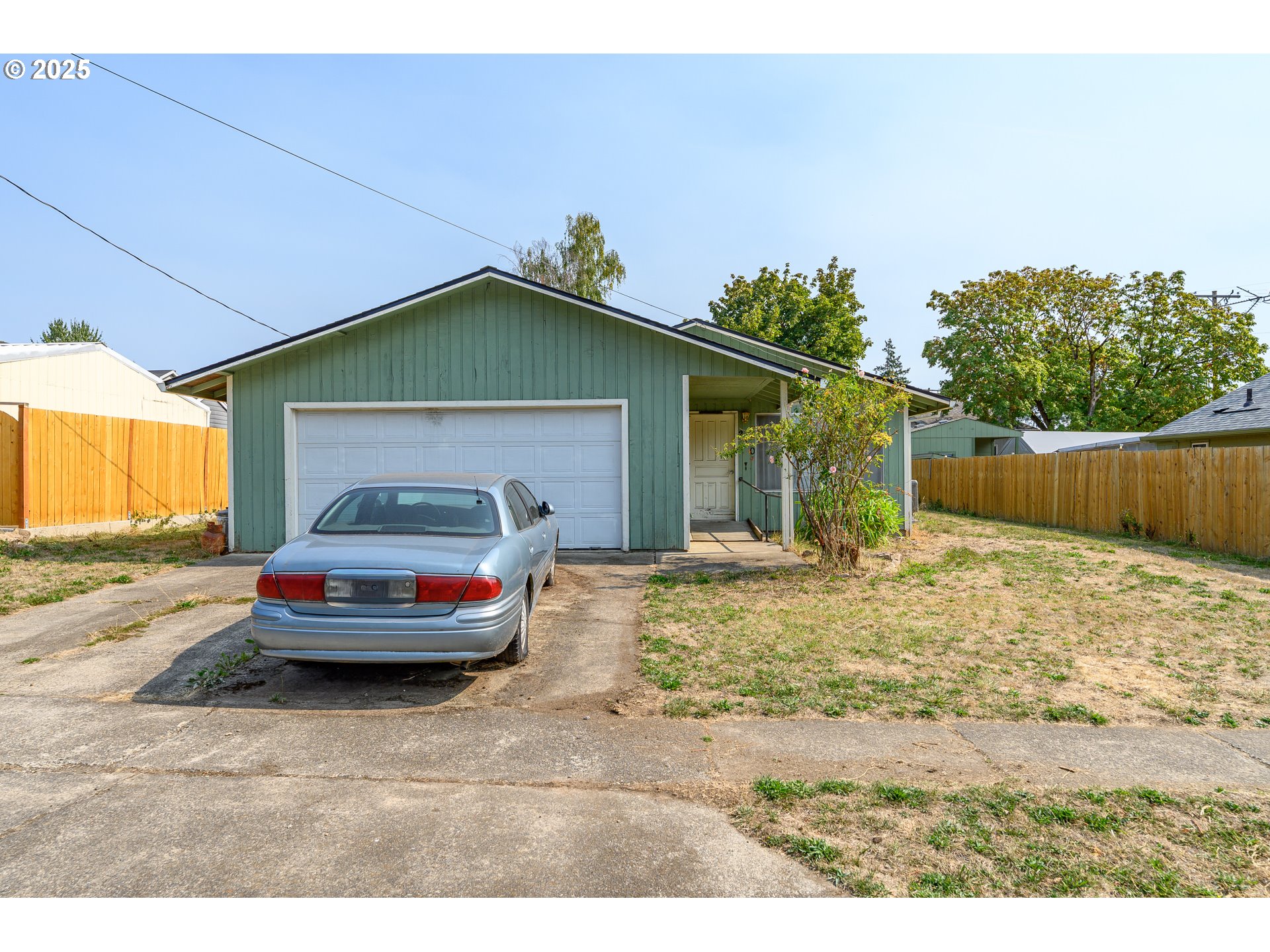 210 South Church Street Newberg, OR 97132 - Photo 23 of 34 a front view of a house with a yard