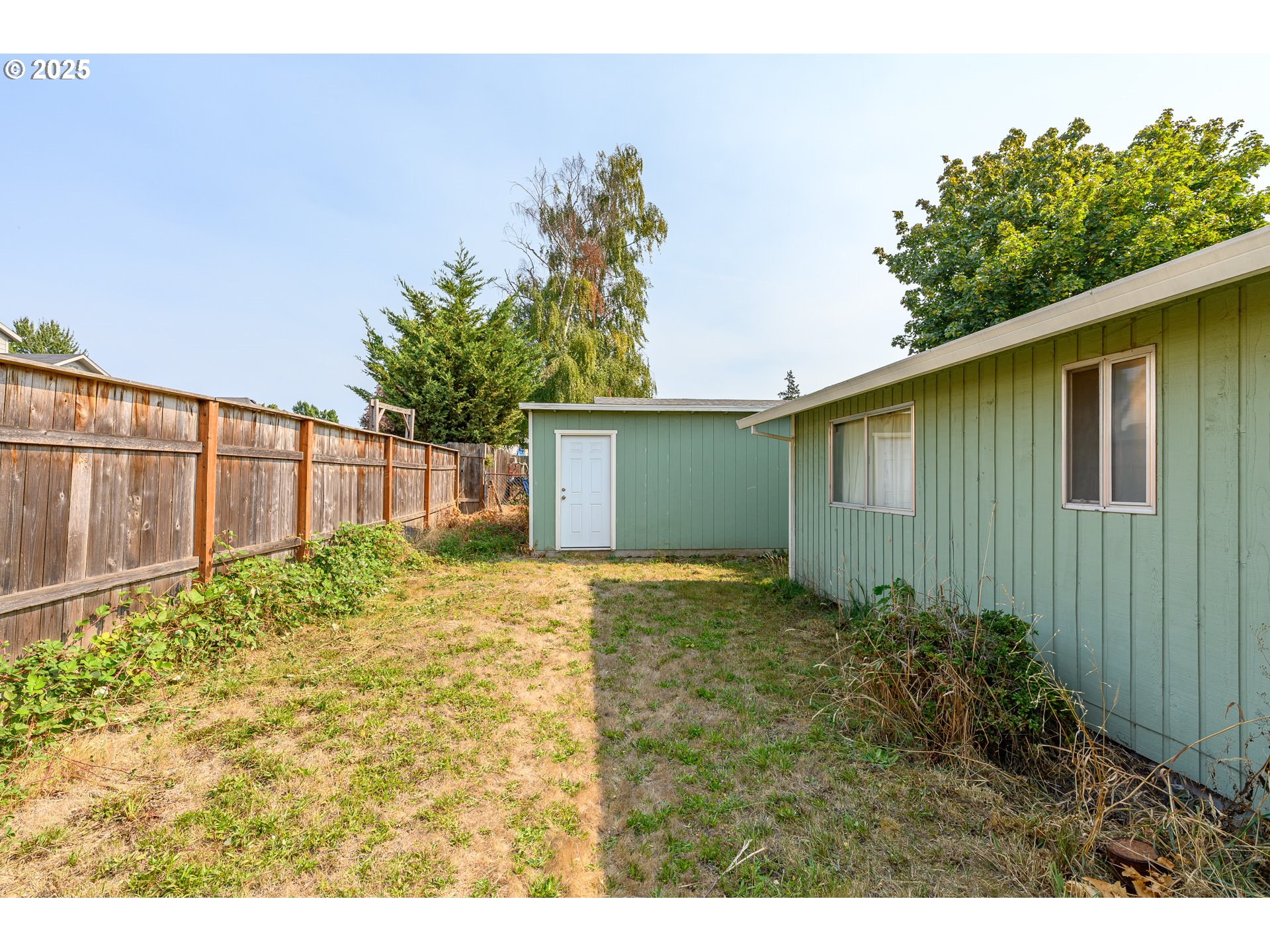 210 South Church Street Newberg, OR 97132 - Photo 26 of 34 a view of backyard with pathway