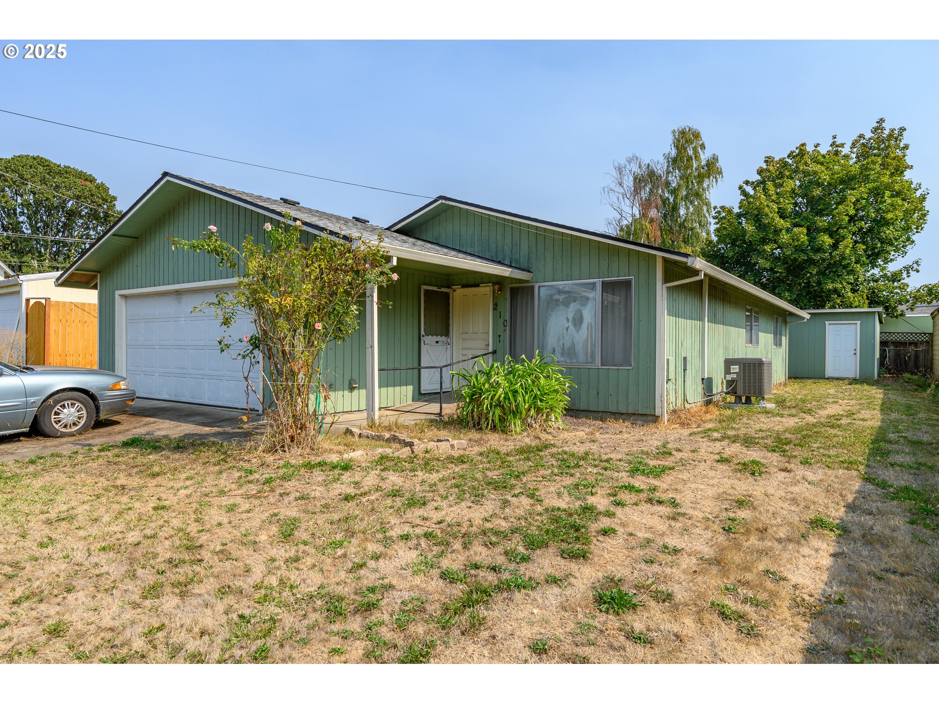 210 South Church Street Newberg, OR 97132 - Photo 29 of 34 a view of a house with a patio