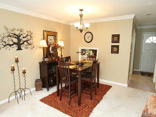 1906 Township Circle Raleigh, NC 27609 - Photo 4 of 12 Spacious Dining Room with Pass Through Window. Carpet in Excellent Condition!