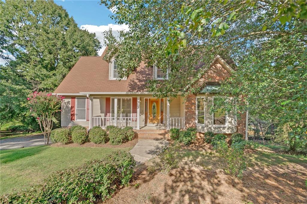 109 Warwick Way Southeast Rome, GA 30161 - Photo 1 of 1 a front view of a house with garden