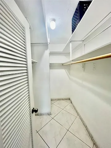 a view of a room with racks on the wall