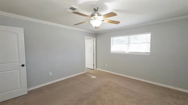 an aerial view of a house with a yard basket ball court and outdoor seating
