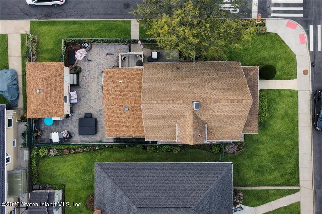 202 Watchogue Road Staten Island, NY 10314 - Photo 5 of 19 an aerial view of a house with a garden and a yard