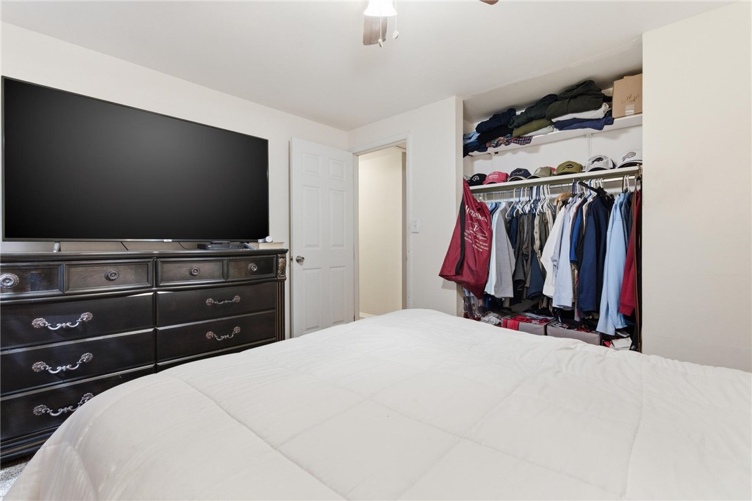 707 West Martindale Road Union, OH 45322 - Photo 15 of 28 This spacious bedroom offers ample storage with a walk-in closet.