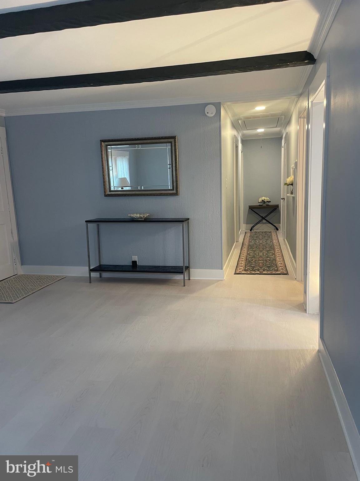 3 Talbot Avenue Cambridge, MD 21613 - Photo 4 of 17 a living room with a couch and a table