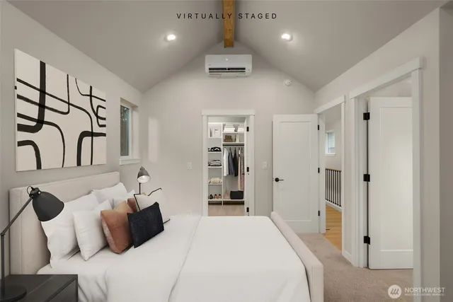 a bedroom with a bed and a walk in closet