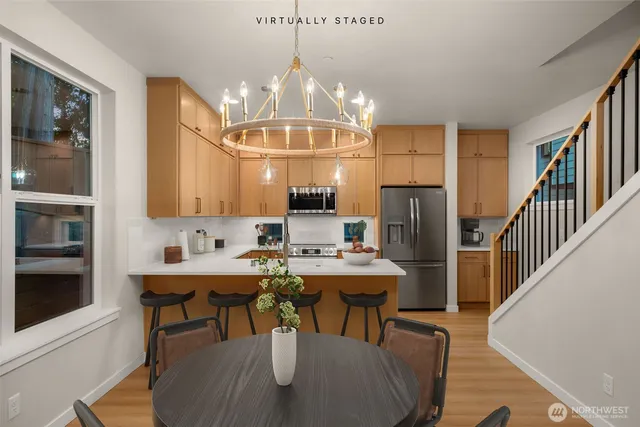 a view of a dining room with furniture