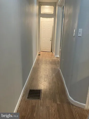 a view of wooden floor and staircase