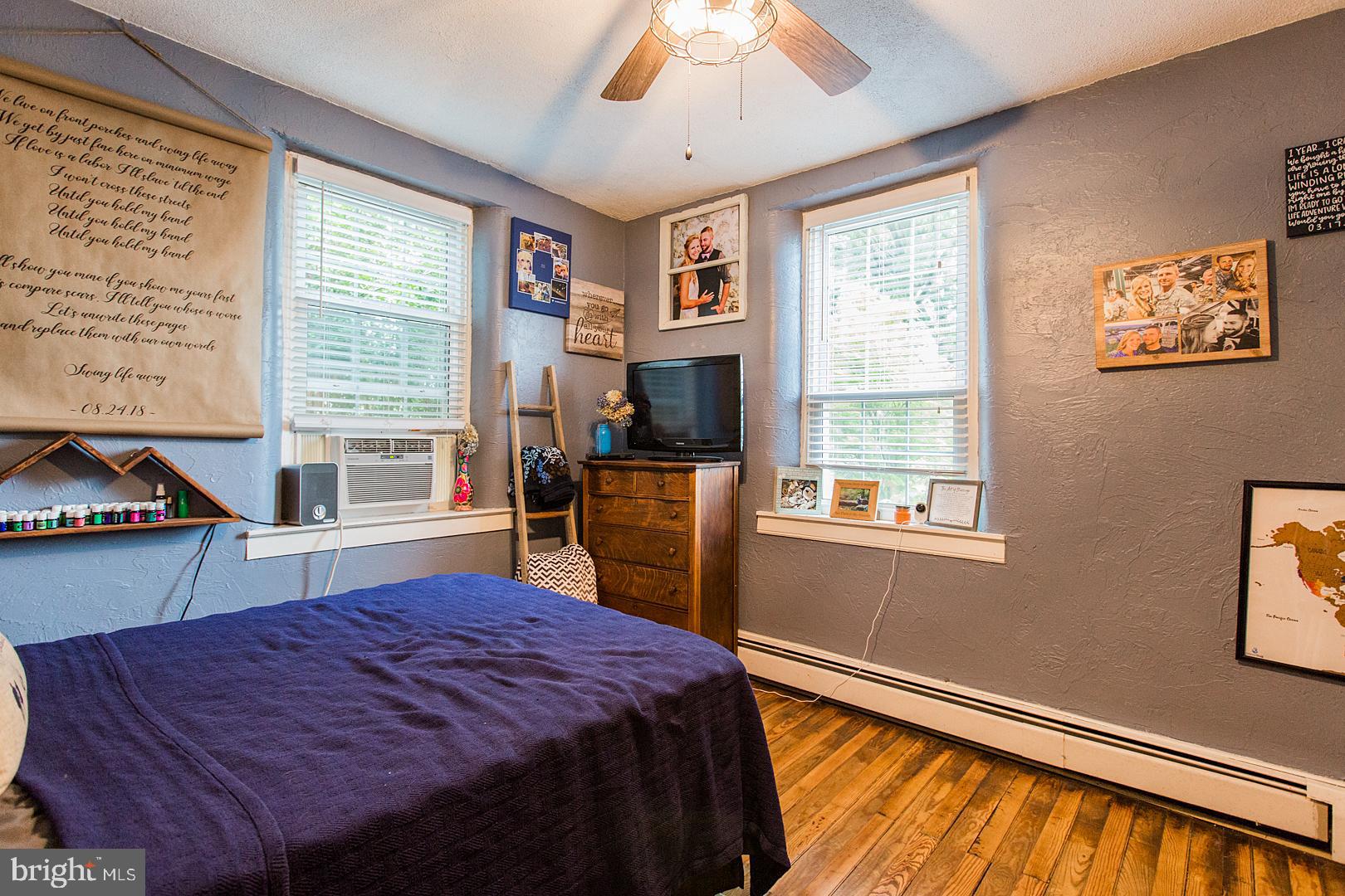 317 West Meadow Valley Road Lititz, PA 17543 - Photo 26 of 59 a bed sitting in a bedroom next to a window