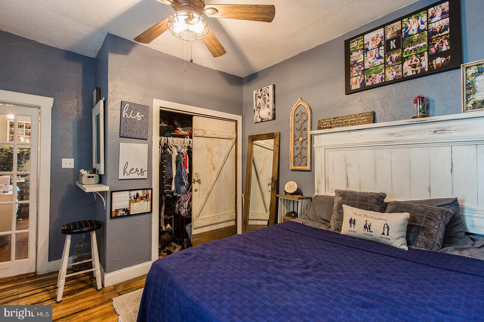 317 West Meadow Valley Road Lititz, PA 17543 - Photo 27 of 59 a bed room with a bed and a chandelier
