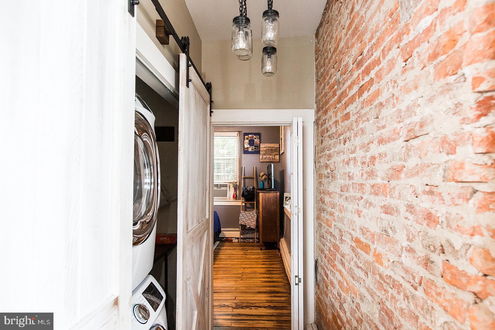 317 West Meadow Valley Road Lititz, PA 17543 - Photo 32 of 59 a view of a hallway with wooden floor and a bathroom