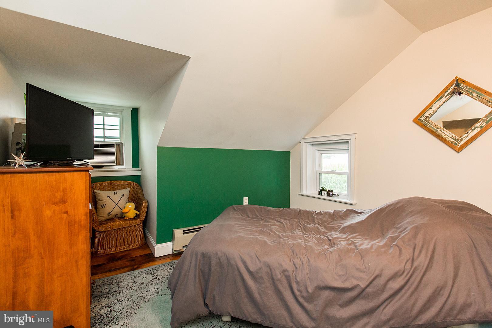 317 West Meadow Valley Road Lititz, PA 17543 - Photo 39 of 59 a bedroom with a bed and flat screen tv