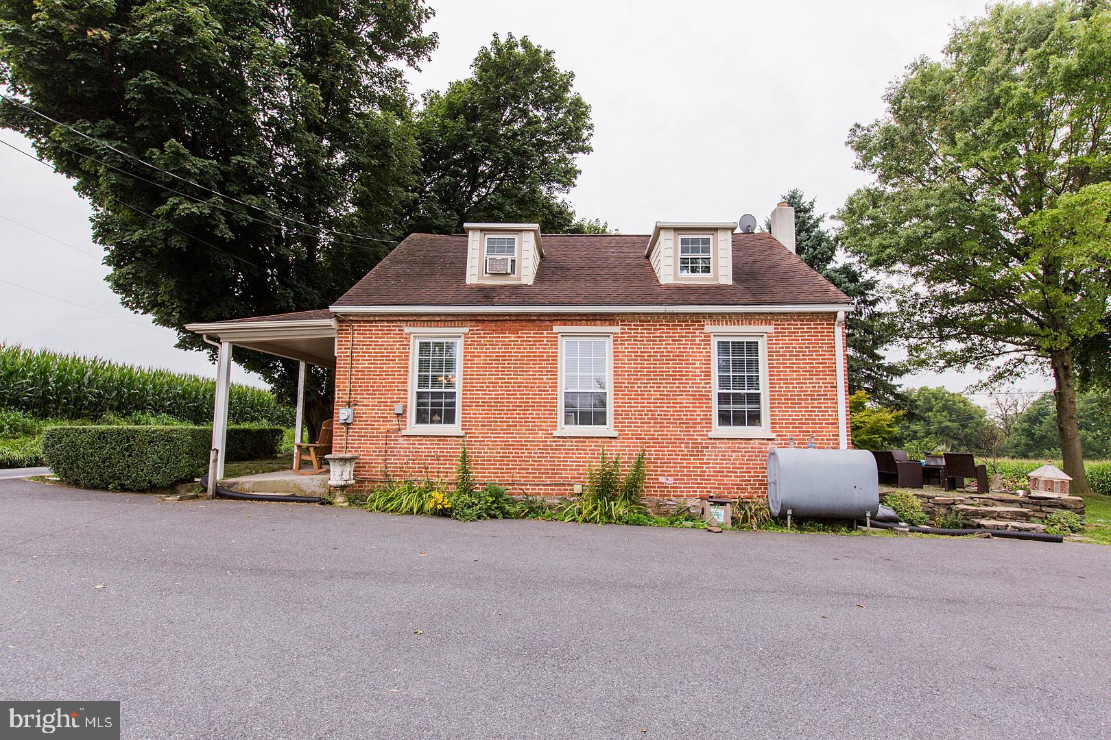 317 West Meadow Valley Road Lititz, PA 17543 - Photo 5 of 59 a front view of a house with garden