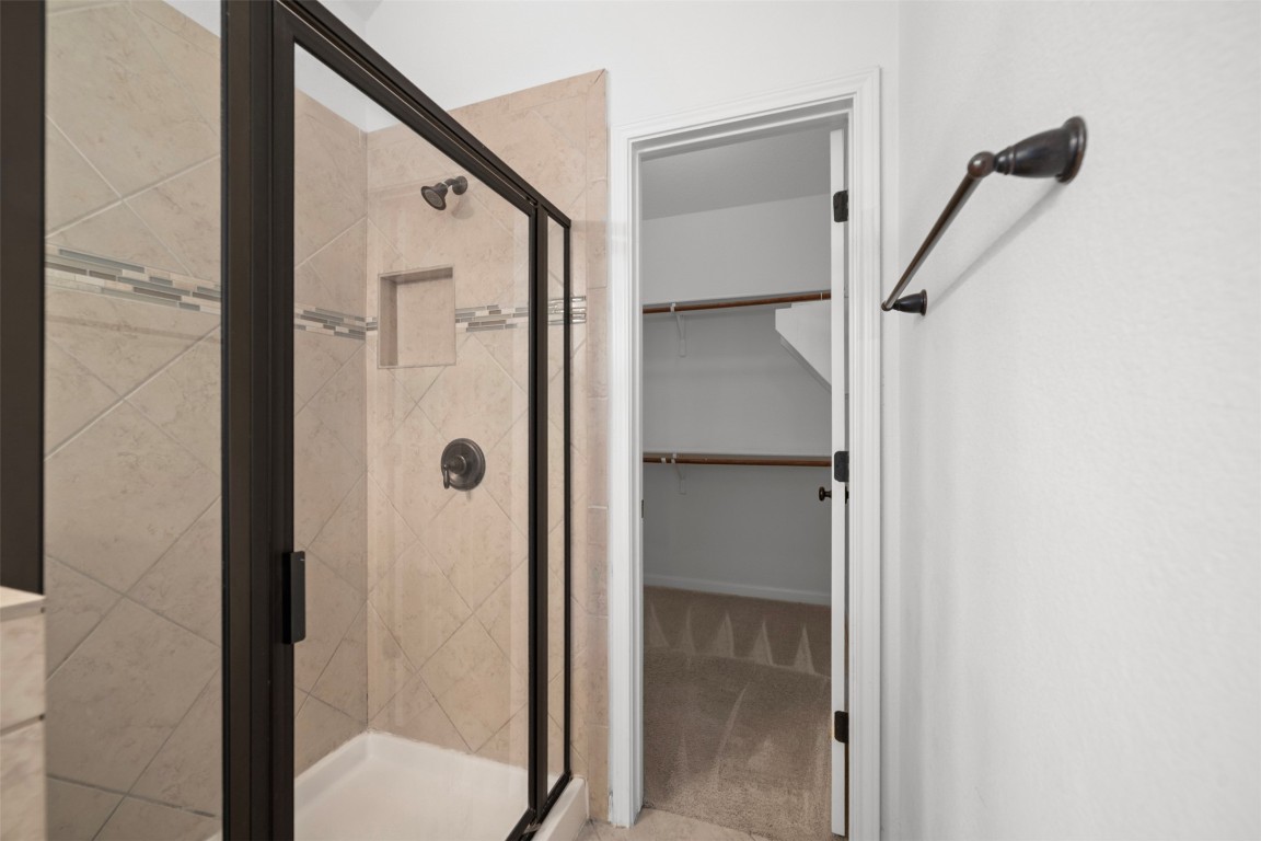 216 Archipelago Trail Austin, TX 78717 - Photo 30 of 40 Full bath featuring a shower stall and a spacious closet