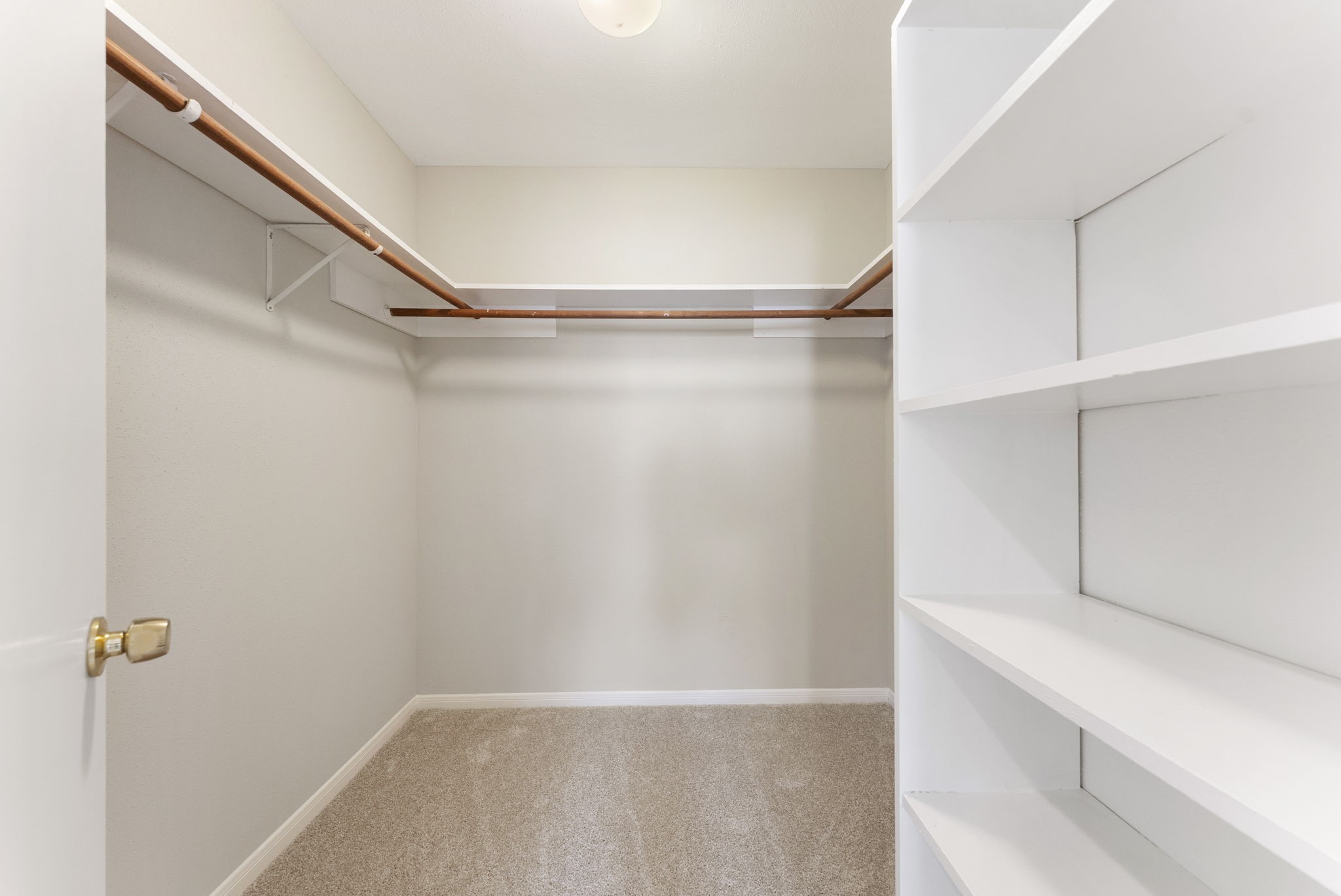 5114 Aberton Lane Spring, TX 77379 - Photo 18 of 31 a view of an empty walk in closet
