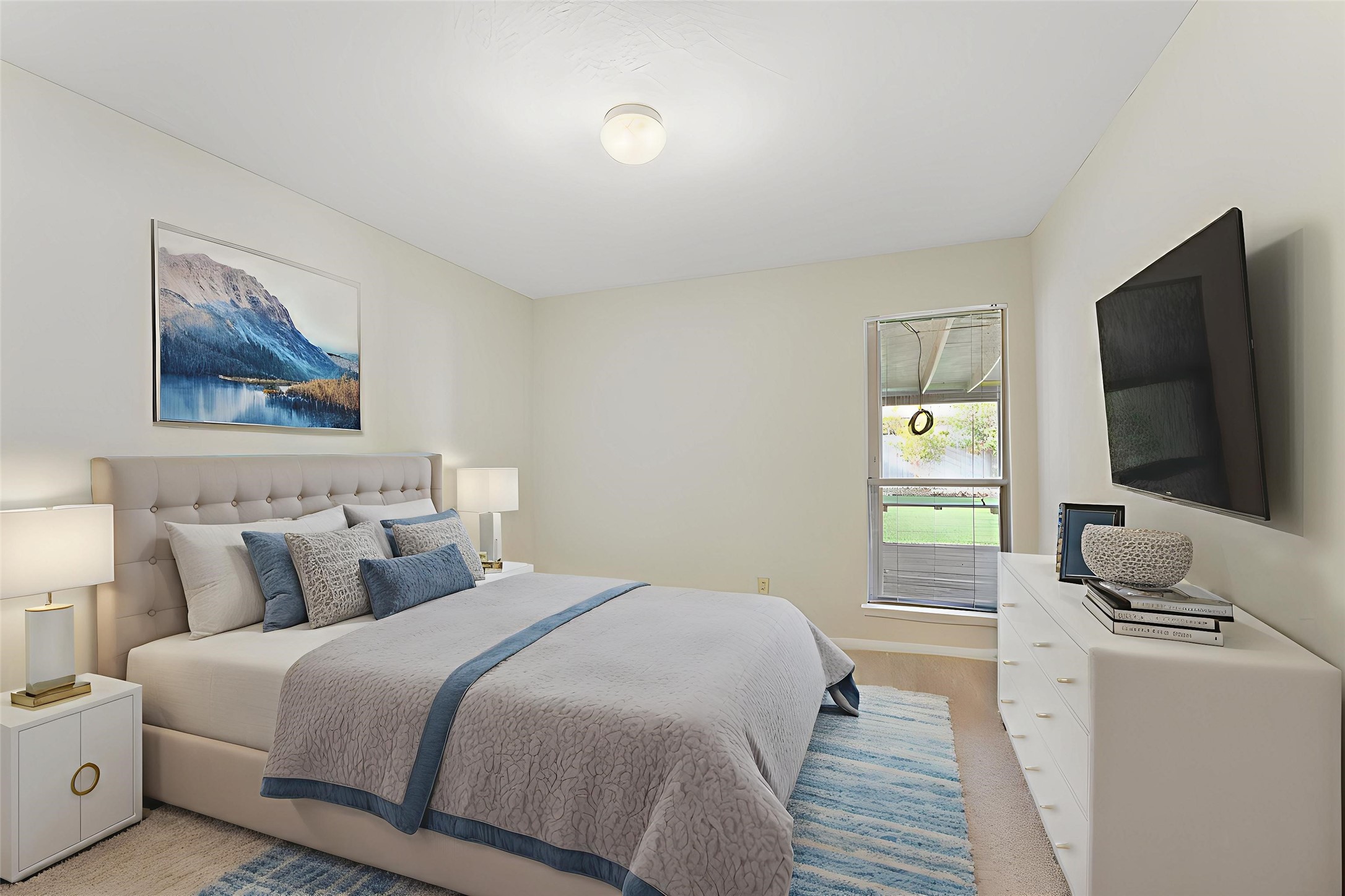 5114 Aberton Lane Spring, TX 77379 - Photo 19 of 31 a bedroom with a bed and a flat screen tv