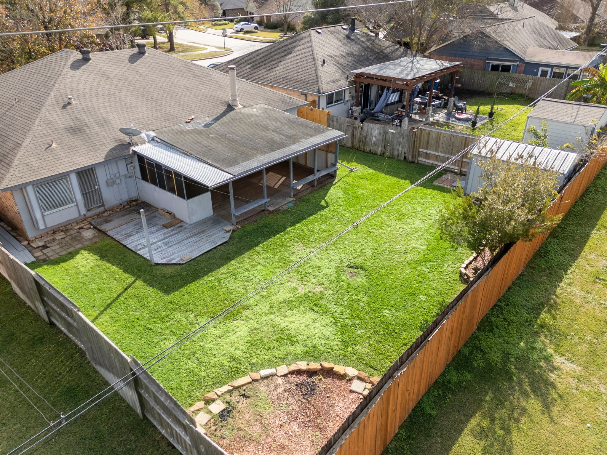5114 Aberton Lane Spring, TX 77379 - Photo 27 of 31 a view of a swimming pool with a patio and a garden