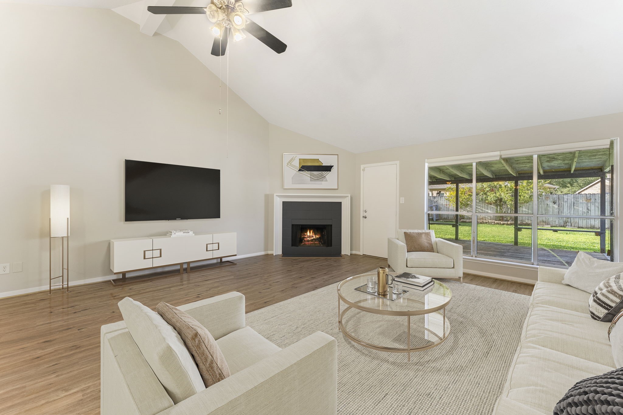 5114 Aberton Lane Spring, TX 77379 - Photo 8 of 31 a living room with furniture fireplace and a flat screen tv