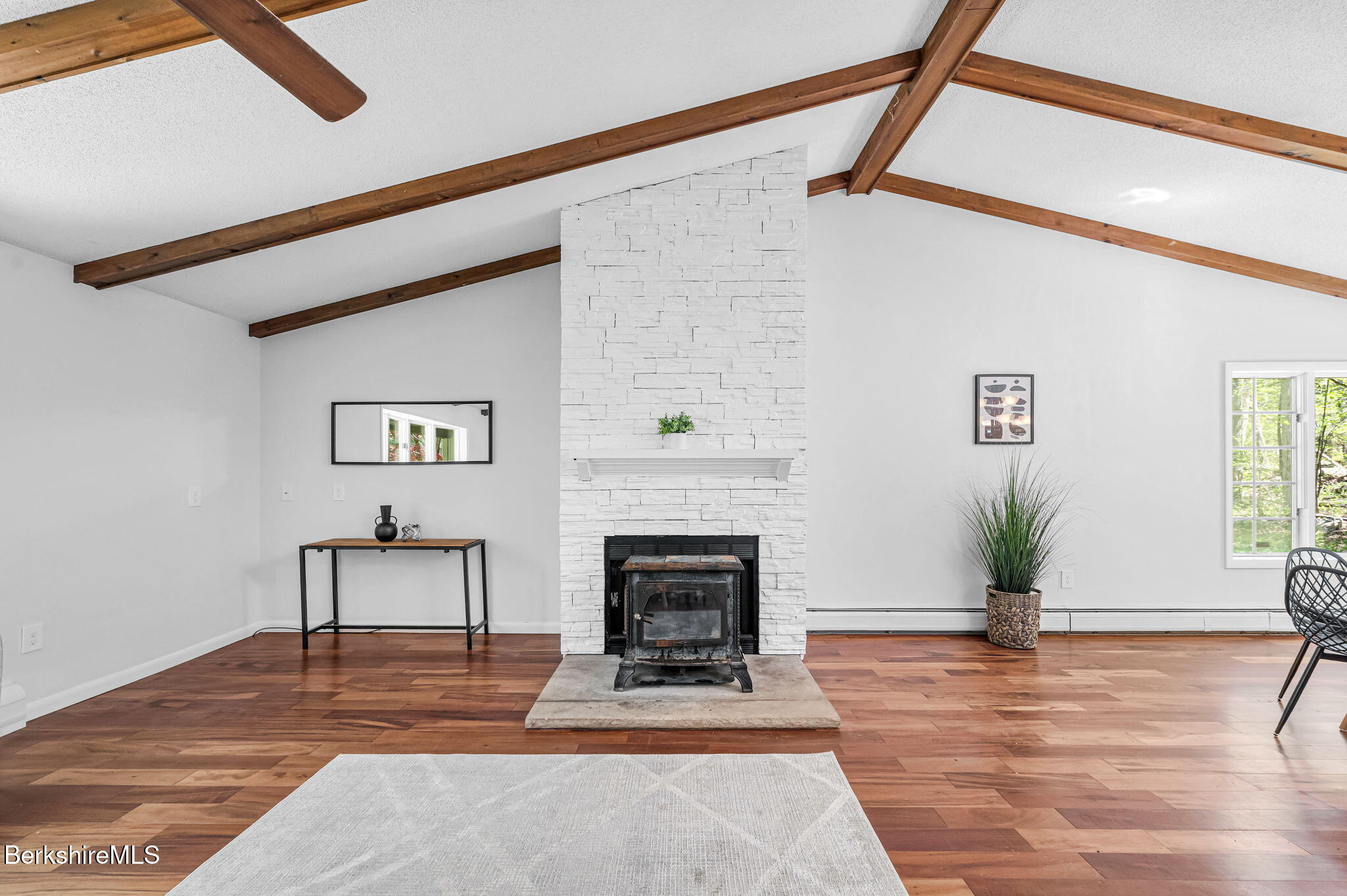 1874 Home Road Sheffield, MA 01230 - Photo 15 of 42 a living room with furniture and a fireplace