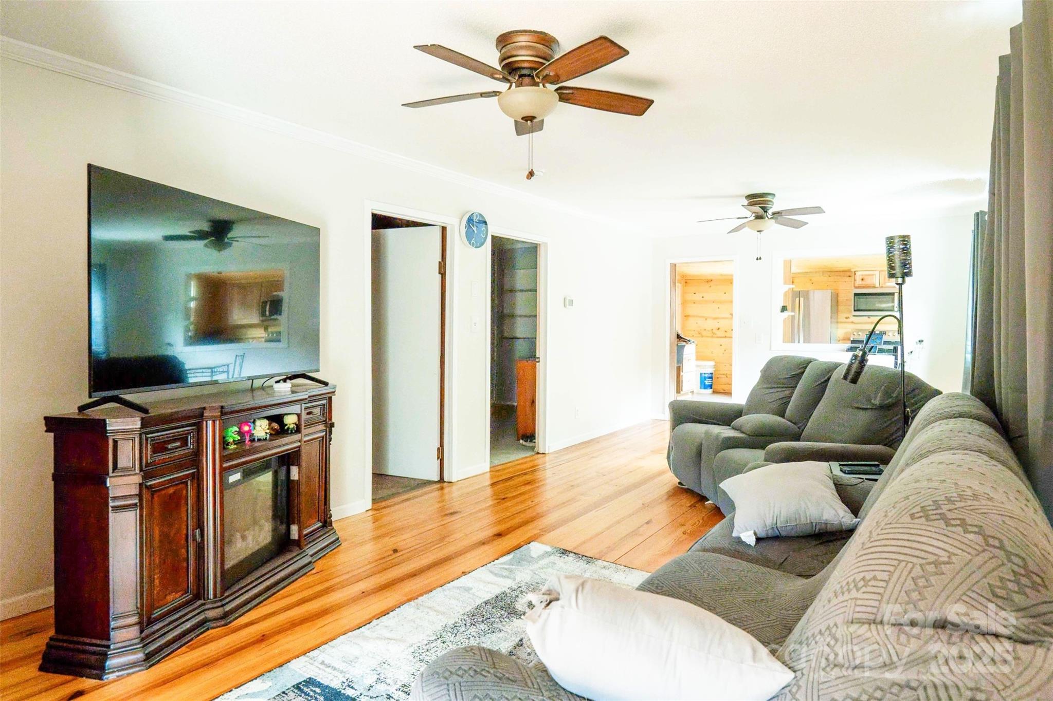 4420 Highway 64 Rutherfordton, NC 28139 - Photo 13 of 35 a living room with furniture and a flat screen tv