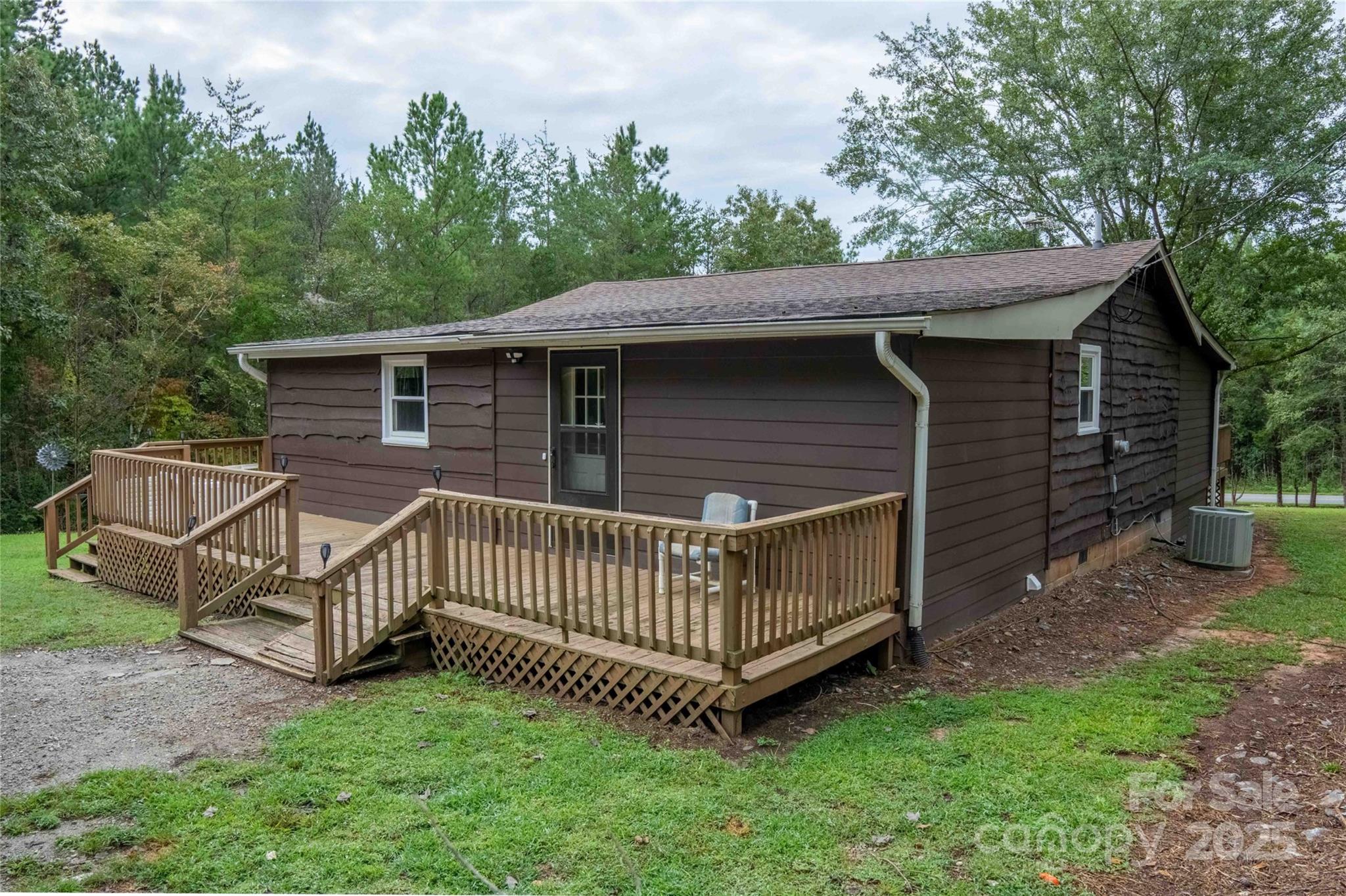 4420 Highway 64 Rutherfordton, NC 28139 - Photo 2 of 35 a view of backyard with deck and garden