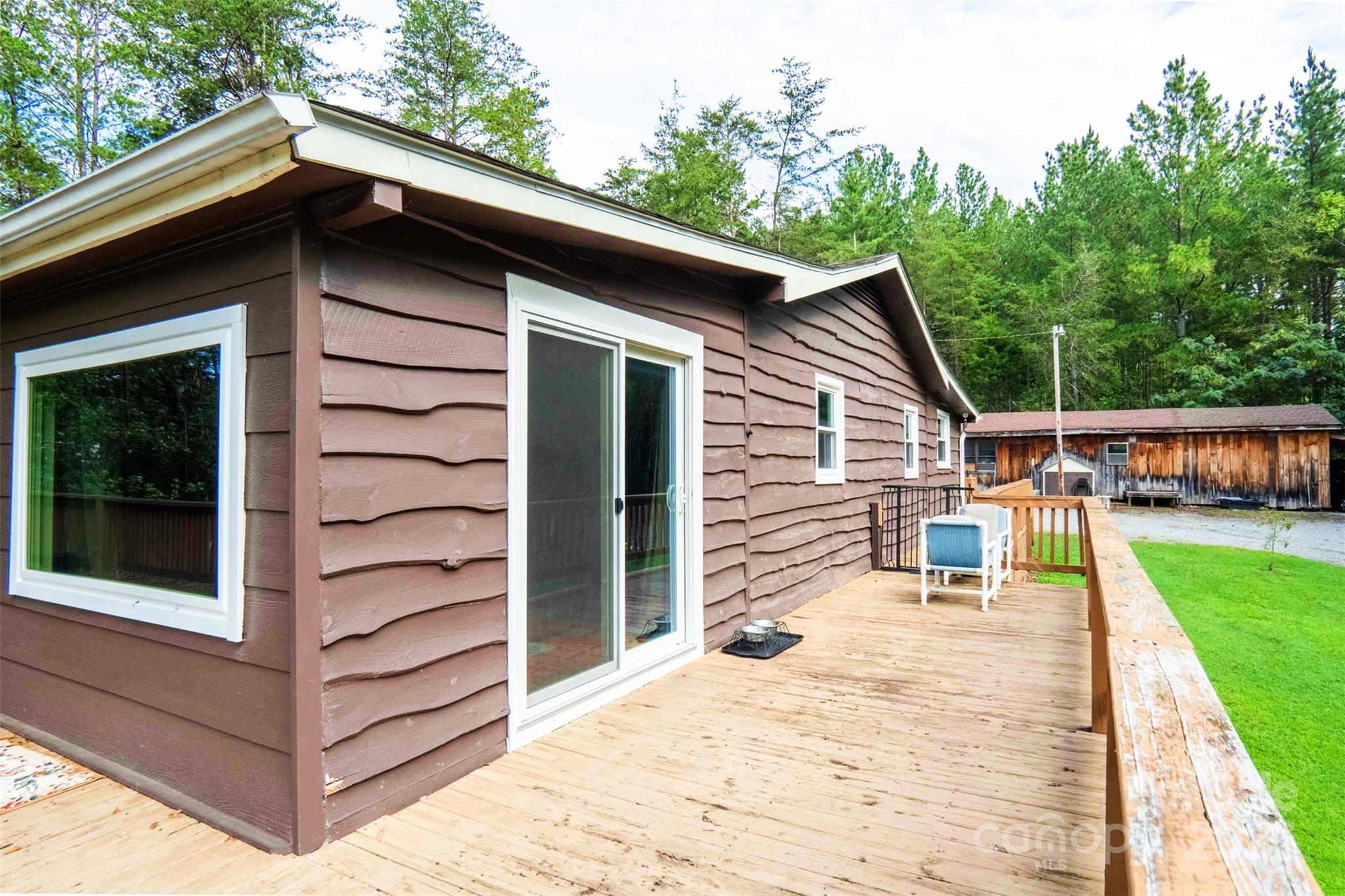 4420 Highway 64 Rutherfordton, NC 28139 - Photo 29 of 35 a view of house with backyard and deck