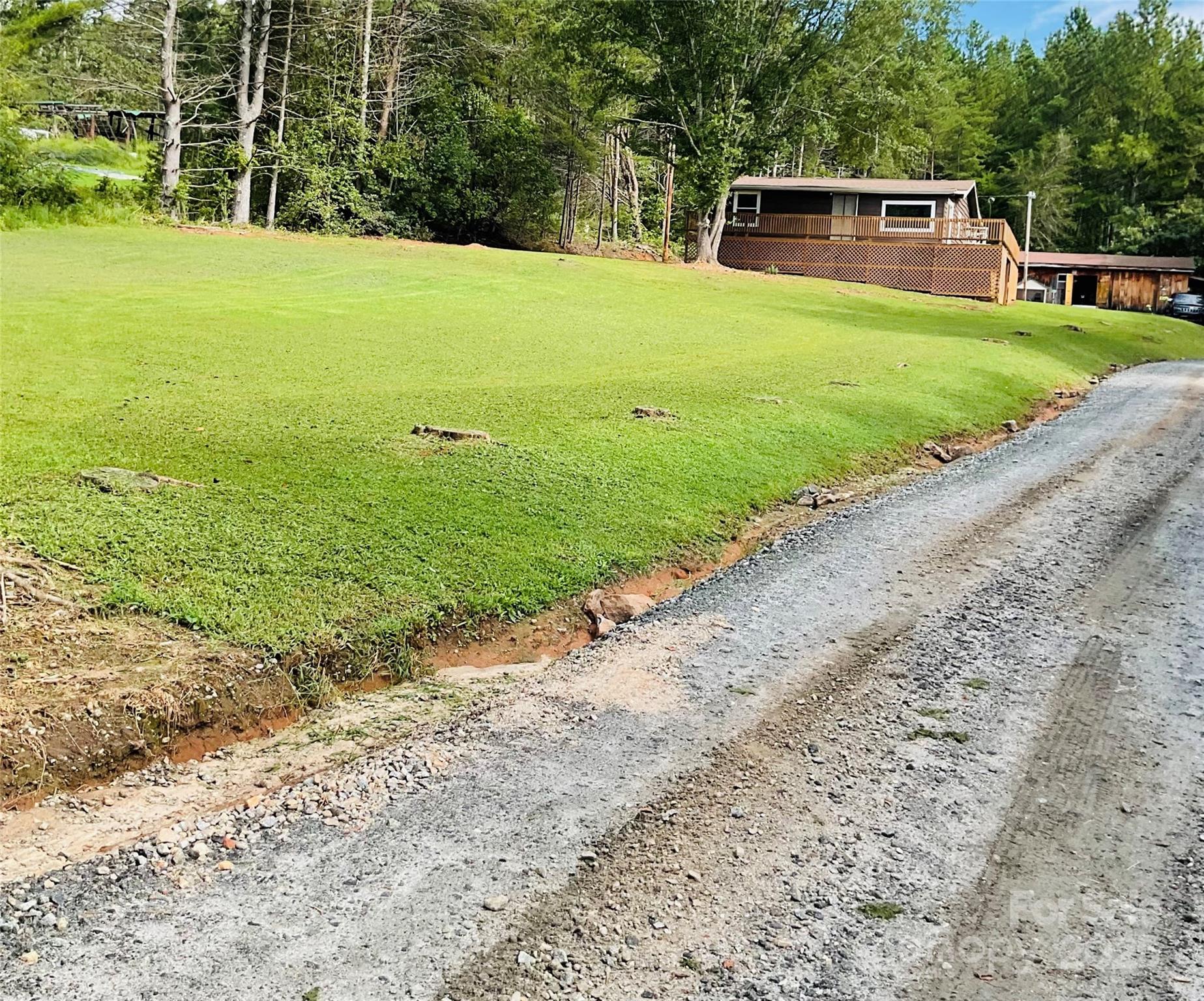 4420 Highway 64 Rutherfordton, NC 28139 - Photo 33 of 35 a view of a backyard with large trees
