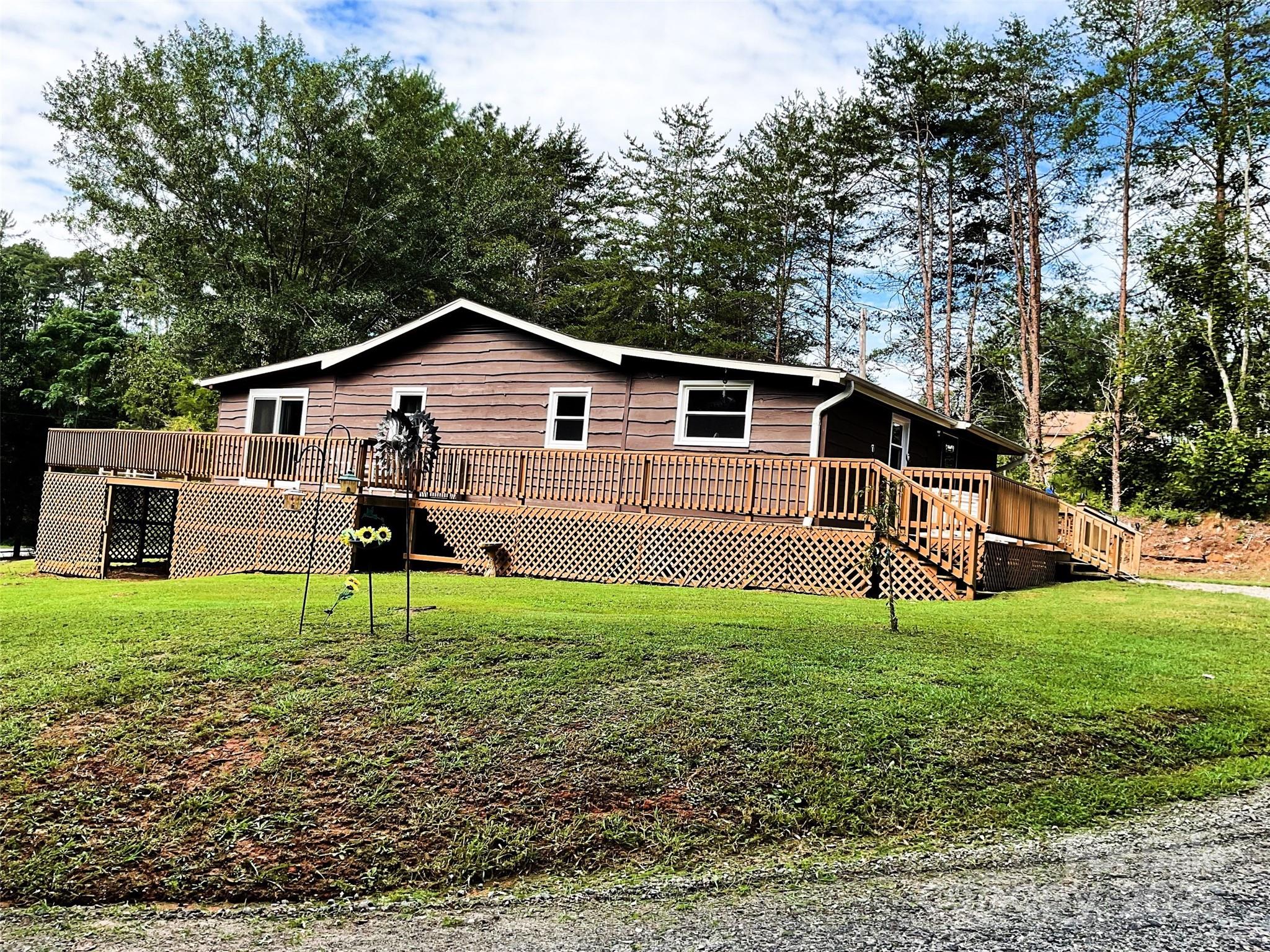 4420 Highway 64 Rutherfordton, NC 28139 - Photo 5 of 35 a house view with a garden space