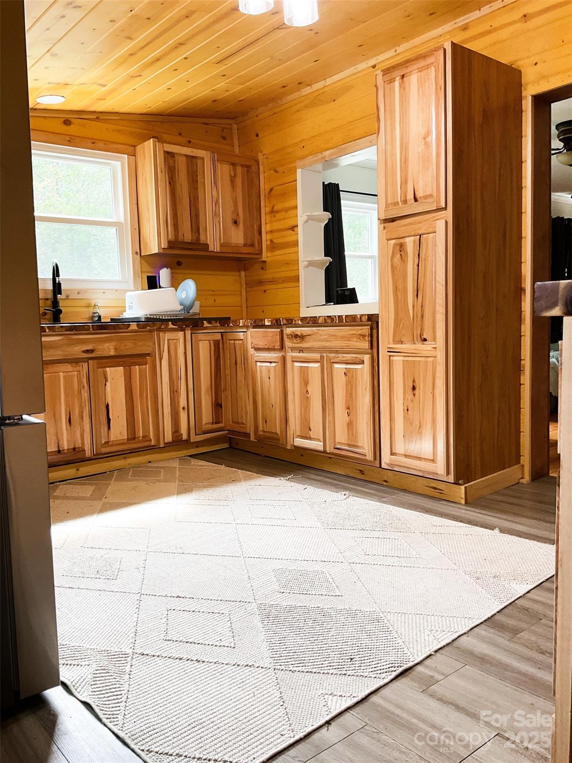 4420 Highway 64 Rutherfordton, NC 28139 - Photo 10 of 35 a view of a kitchen with wooden cabinets