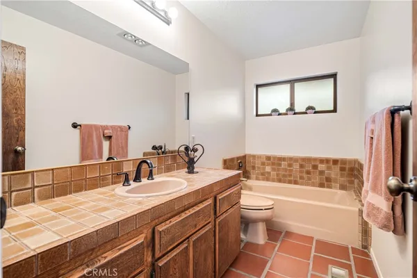 a view of storage and utility room with washer and dryer