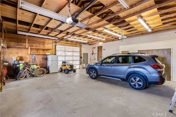 a view of a house with a yard porch and sitting area