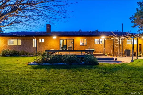 a view of a terrace with a garden