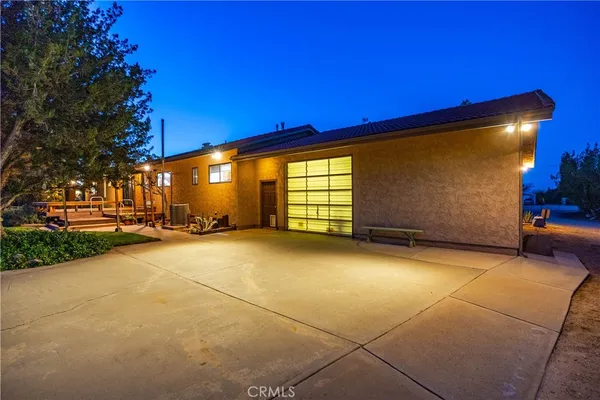 a view of a livingroom with furniture and window