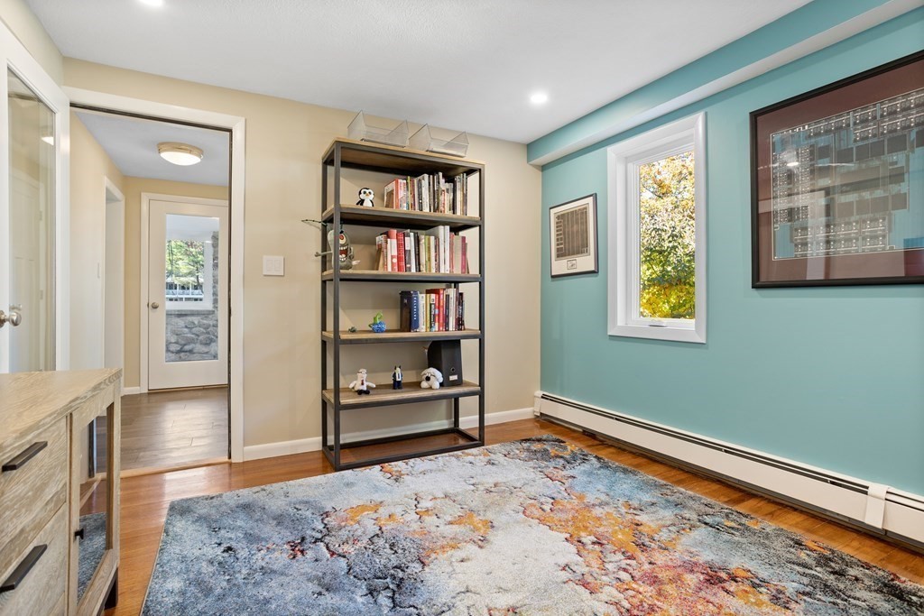 30 Davis Road Stow, MA 01775 - Photo 23 of 42 a bedroom with a bed and a window