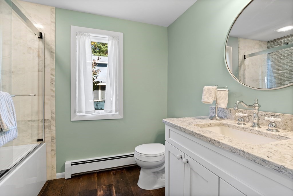 30 Davis Road Stow, MA 01775 - Photo 24 of 42 a bathroom with a granite countertop sink toilet and shower