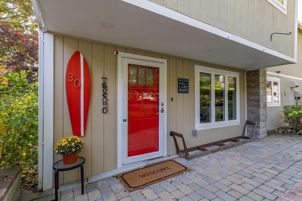 30 Davis Road Stow, MA 01775 - Photo 3 of 42 a front view of a house with entryway