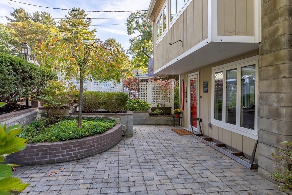 30 Davis Road Stow, MA 01775 - Photo 4 of 42 a front view of a house with a yard