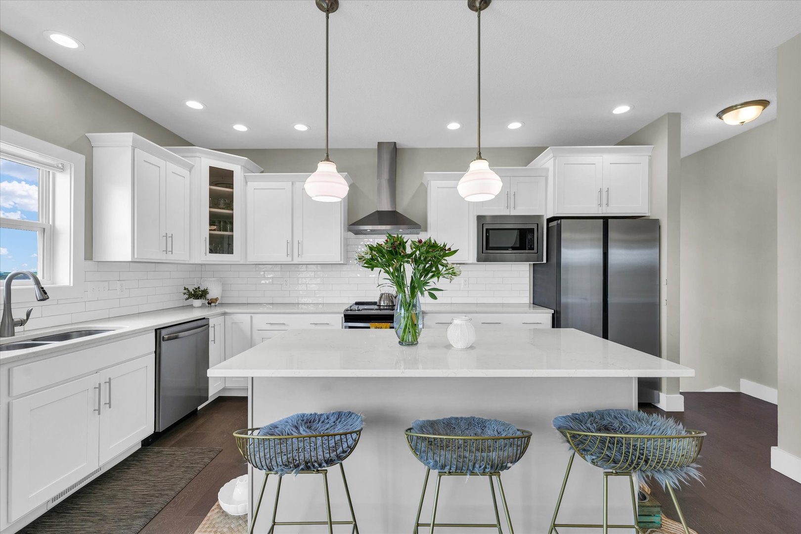 1908 Littlefield Lane Mahomet, IL 61853 - Photo 14 of 51 a kitchen with stainless steel appliances granite countertop a sink a stove a refrigerator and chairs