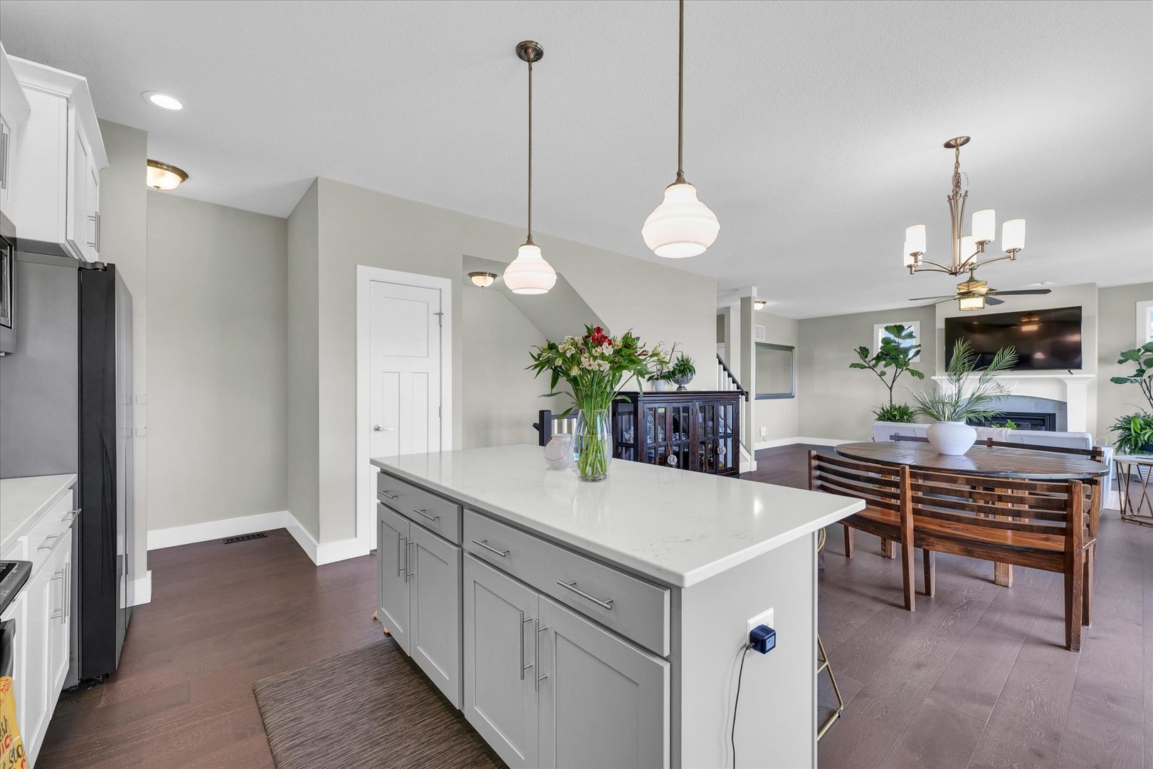 1908 Littlefield Lane Mahomet, IL 61853 - Photo 18 of 51 a kitchen with kitchen island a chandelier and a stove